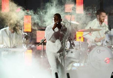 Kendrick Lamar rocks out with Imagine Dragons at the 56th Annual Grammys (Photo Credit:FREDERIC J. BROWN/Getty) 