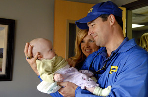 Coach Taylor with his newborn daughter Gracie from "Friday Night Lights"